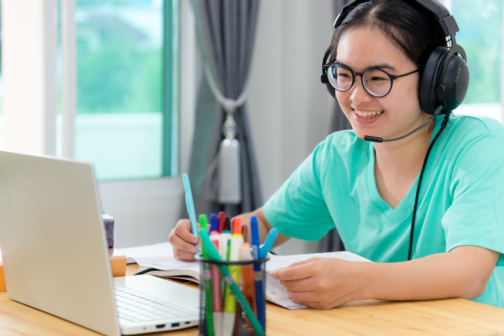 Asian woman student happy in class online learning